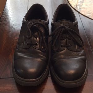 Used black hush puppie shoes